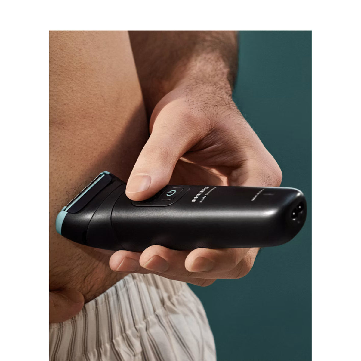 Philips Men's Body Groomer. Showerproof Men's Wet and Dry Body Shaving Trimmer Electric Razor